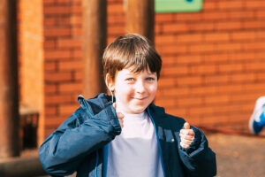 Smiling Boy on Playground