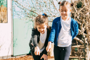 Two Children in Garden